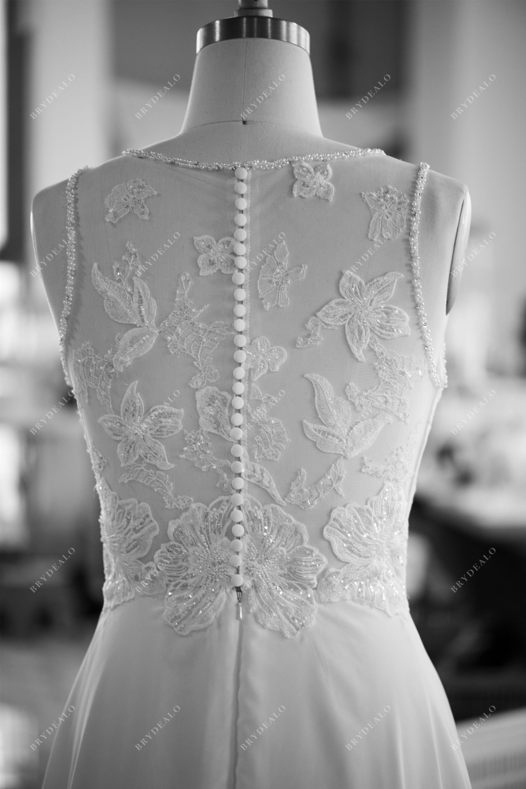 designer illusion button lace back wedding gown