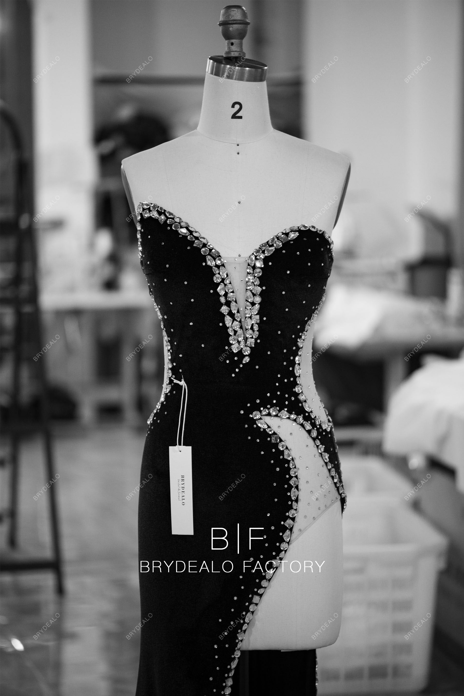 tailored strapless plunging rhinestone velvet prom dress
