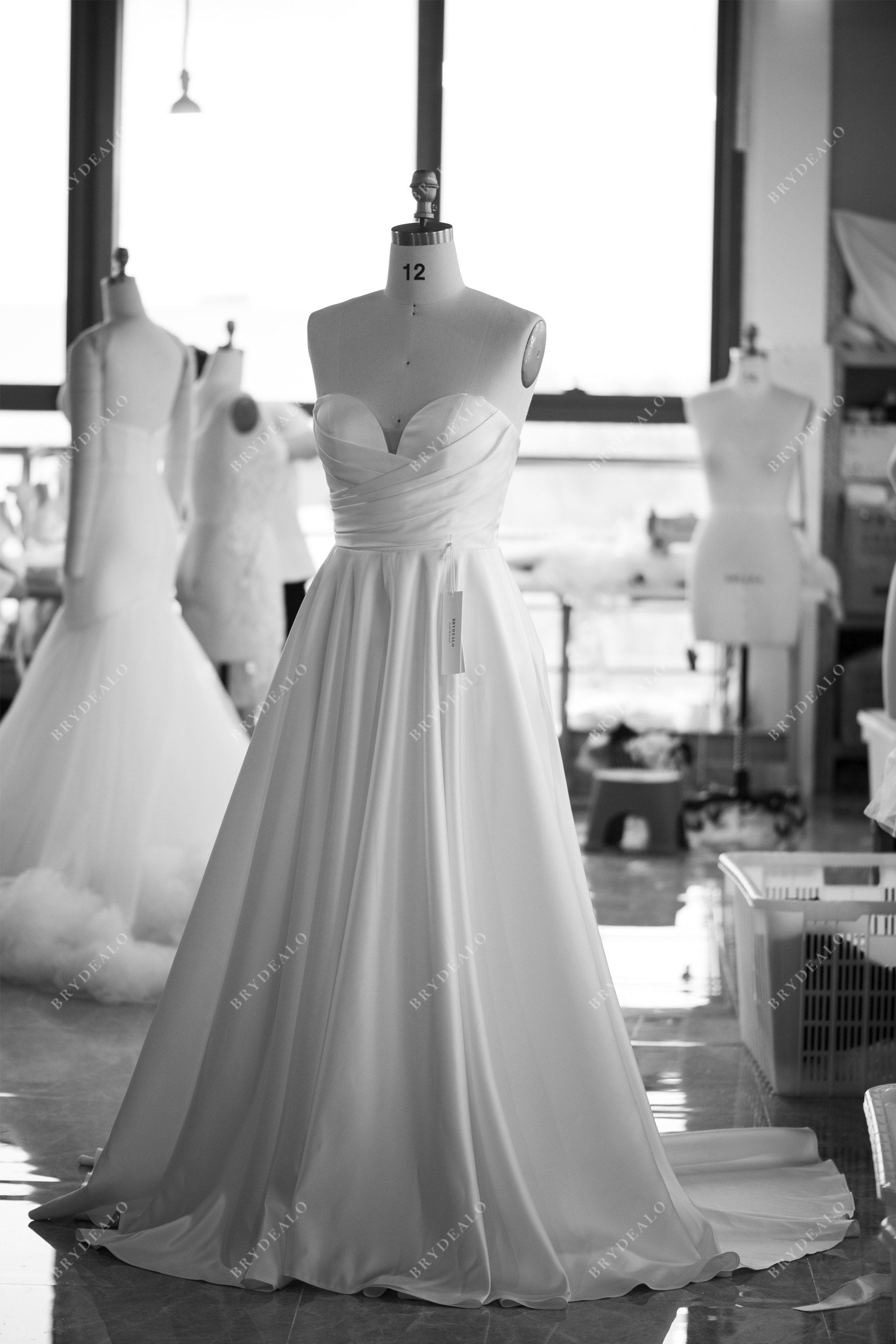 tailored strapless satin A-line wedding dress