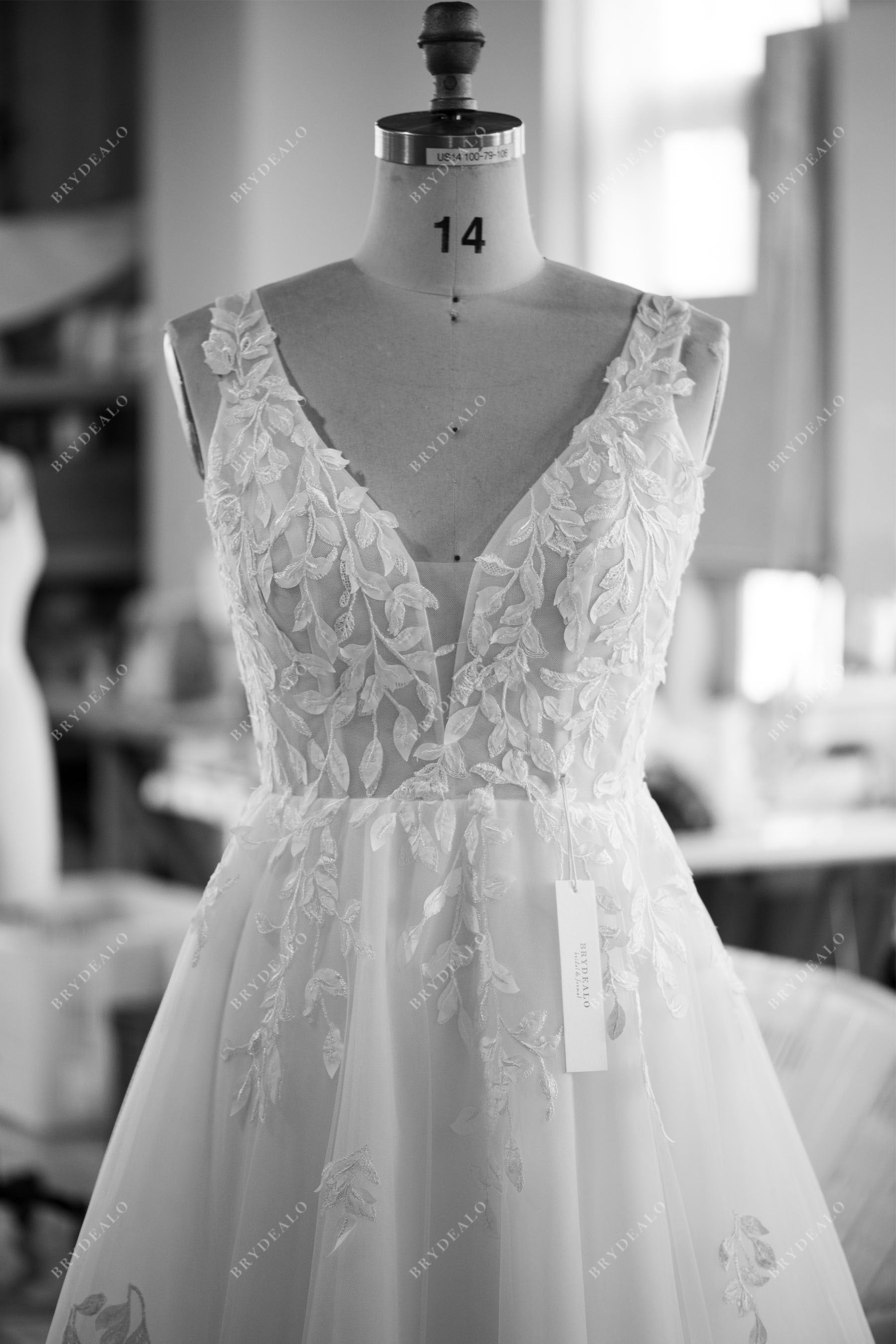 destination sleeveless straps leaf lace wedding gown