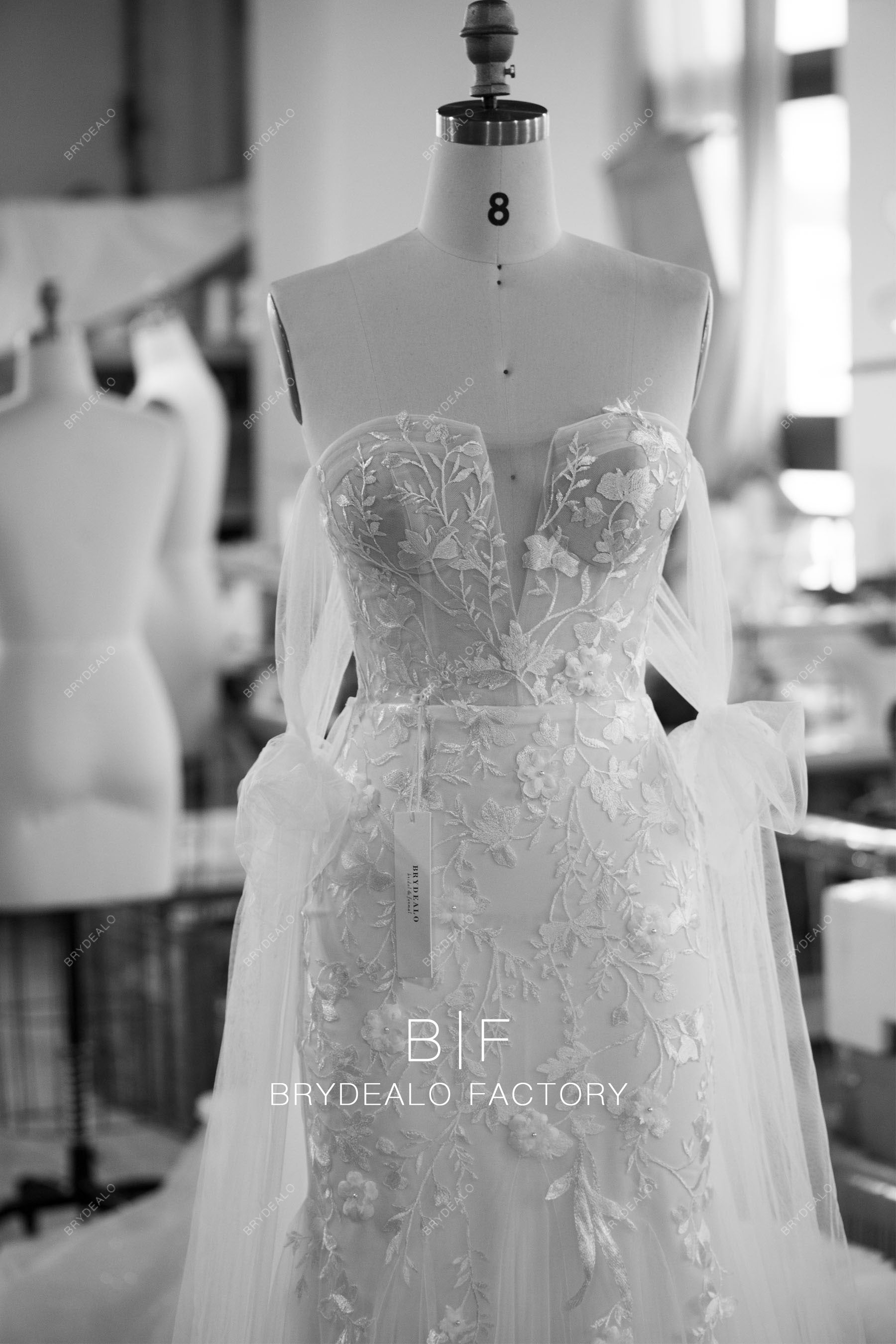 v-cut strapless lace tulle trumpet bridal gown